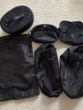 lululemon 6 piece travel set - 3 packing cubes, mini pouch, laundry & toiletry 🖤